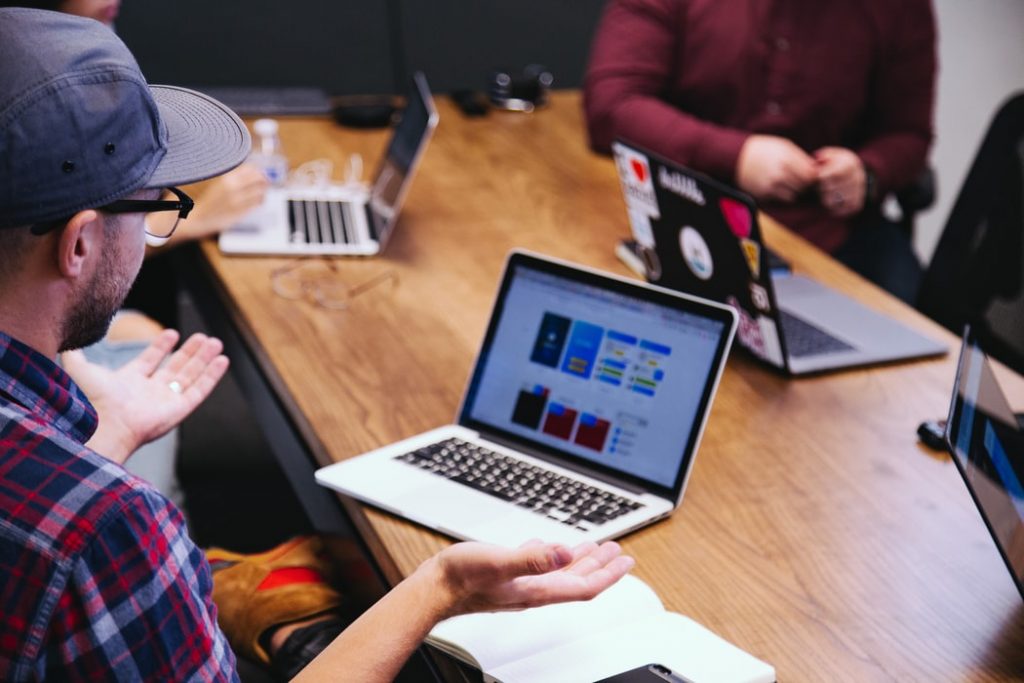 5-6 people are enough to run a web design startup.